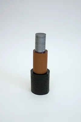 Can (sooted) and Can (rusted) and Can