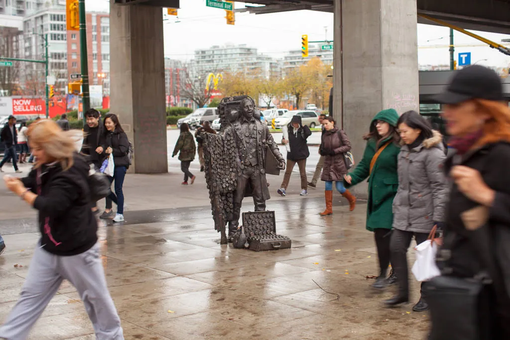 frontal view with crowd passing by